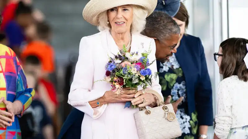 Queen Camilla loves Lady Dior's bag for two days in a row this week - literally a handbag named after Princess Diana