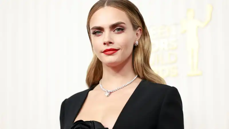 Cara Delevingne recalls getting drunk at age 8.