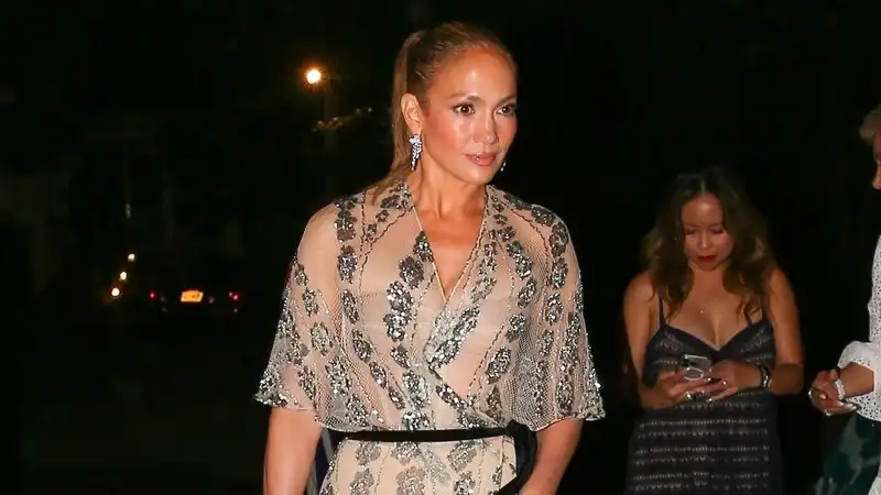 Jennifer Lopez wears a shimmery, near-naked Dior dress to her 55th birthday dinner