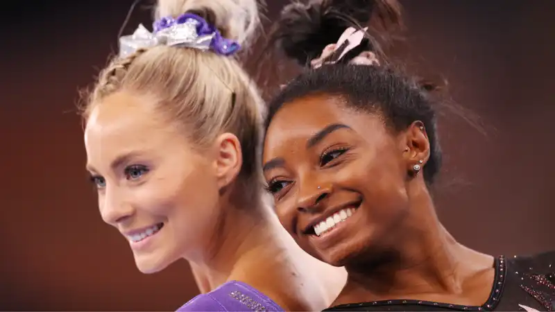 Simone Biles smirks at being "blocked" by Mykayla Skinner's Olympic drama.