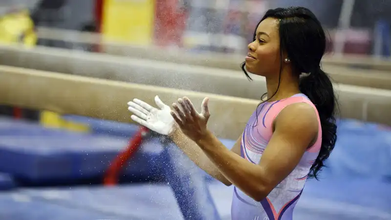 Former Olympian Gabby Douglas says she is "constantly bullied" by gymnastics fans.