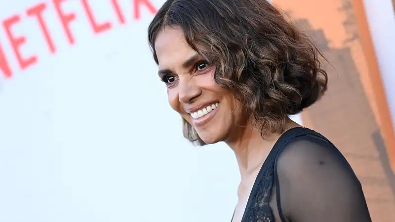 Halle Berry shows off a near-naked sheer lace dress at “The Union” premiere.