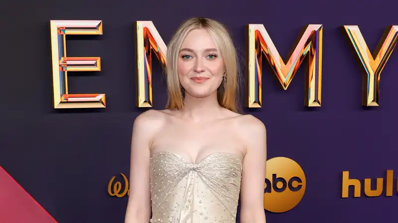 Dakota Fanning's gold and pearl 2024 Emmy red carpet dress looks like a champagne glass