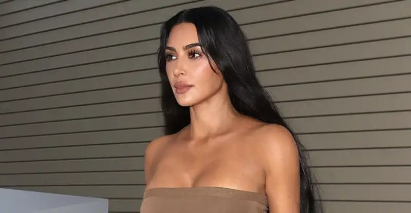 Kim Kardashian revives her barefoot shoe obsession with sky-high pleather pumps and bandeau bra