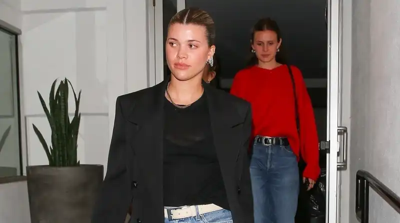 Sofia Richie, classic fall coat and jeans with micro mini Loro Piana bag.