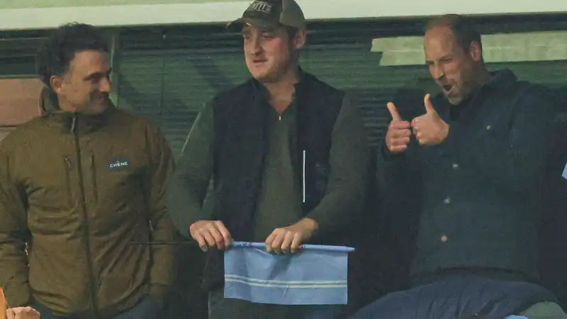 Prince William enjoys a sporty dad's night out with Princess Charlotte's godfather