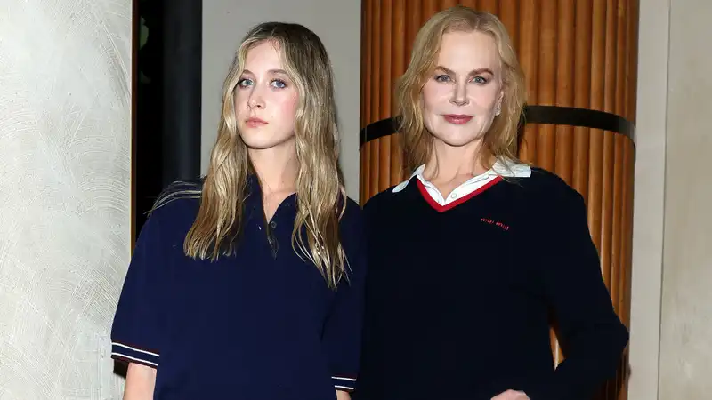 Nicole Kidman and daughter Sunday Rose in a preppy plaid skirt at Paris Fashion Week