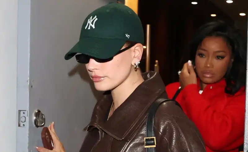 Haley Bieber embraces the bomber jacket trend in fall's coziest colors