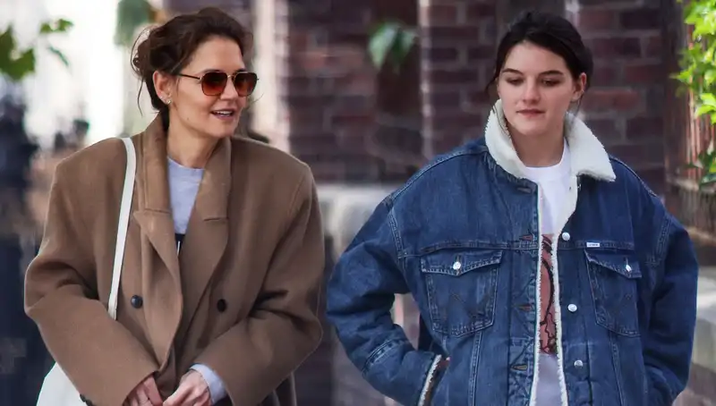 Katie Holmes and Suri Cruz demonstrate two ways to layer fall jackets