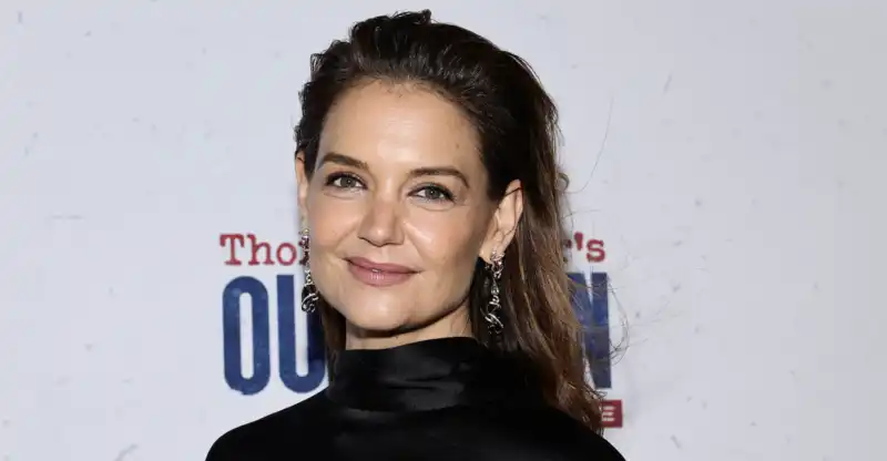 Katie Holmes trades in her favorite denim for the hated relaxed flare jeans.