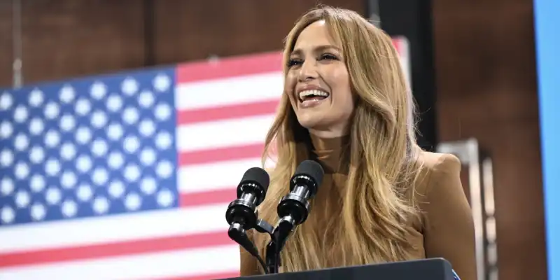 Jennifer Lopez in a brown bodycon dress supporting Kamala Harris for Latte Dressing