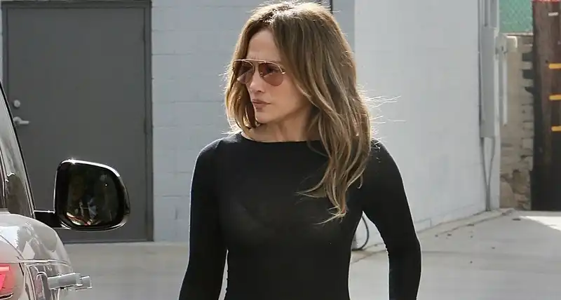 Jennifer Lopez matches her Birkin and pitch-black pedicure for her first recording studio session since her divorce.