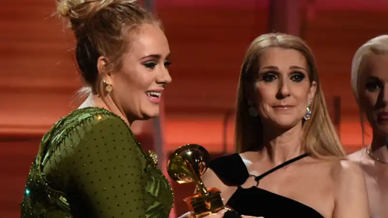 Adele hugs Celine Dion in the audience at her Las Vegas concert.