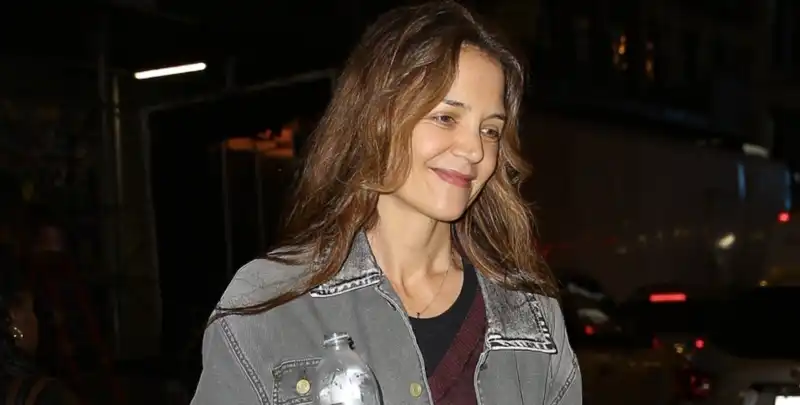 Katie Holmes abandons her favorite designer accessories for a new ballet flat with a cherry red bag