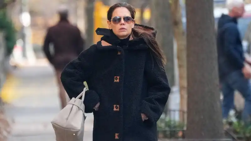 Katie Holmes and her Duffle teddy coat take the trend of socks boots for a Rom-Com worthy spin