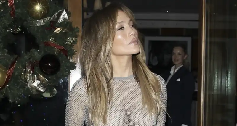 Jennifer Lopez flaunts her nude bra in sheer top, leather skirt, and Bir20,000 Birkin bag