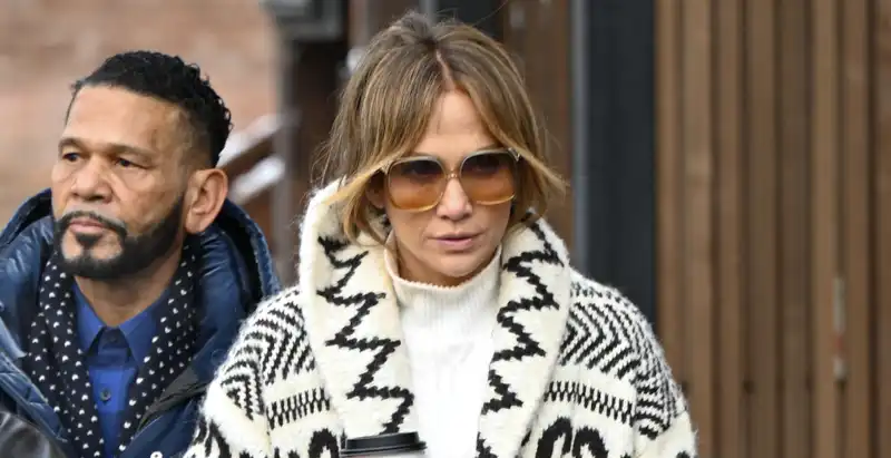 Jennifer Lopez in Aspen wearing a Ralph Lauren Fair Isle sweater and her favorite $1,395 boots