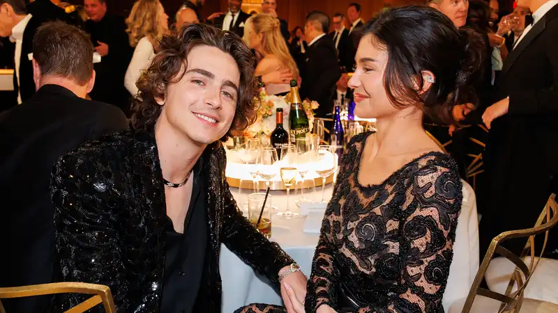 Kylie Jenner and Timothée Chalamet “committed to working together” and he is “now part of the family.”